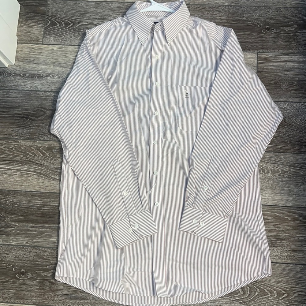 Brand new button up dress shirt. Size M